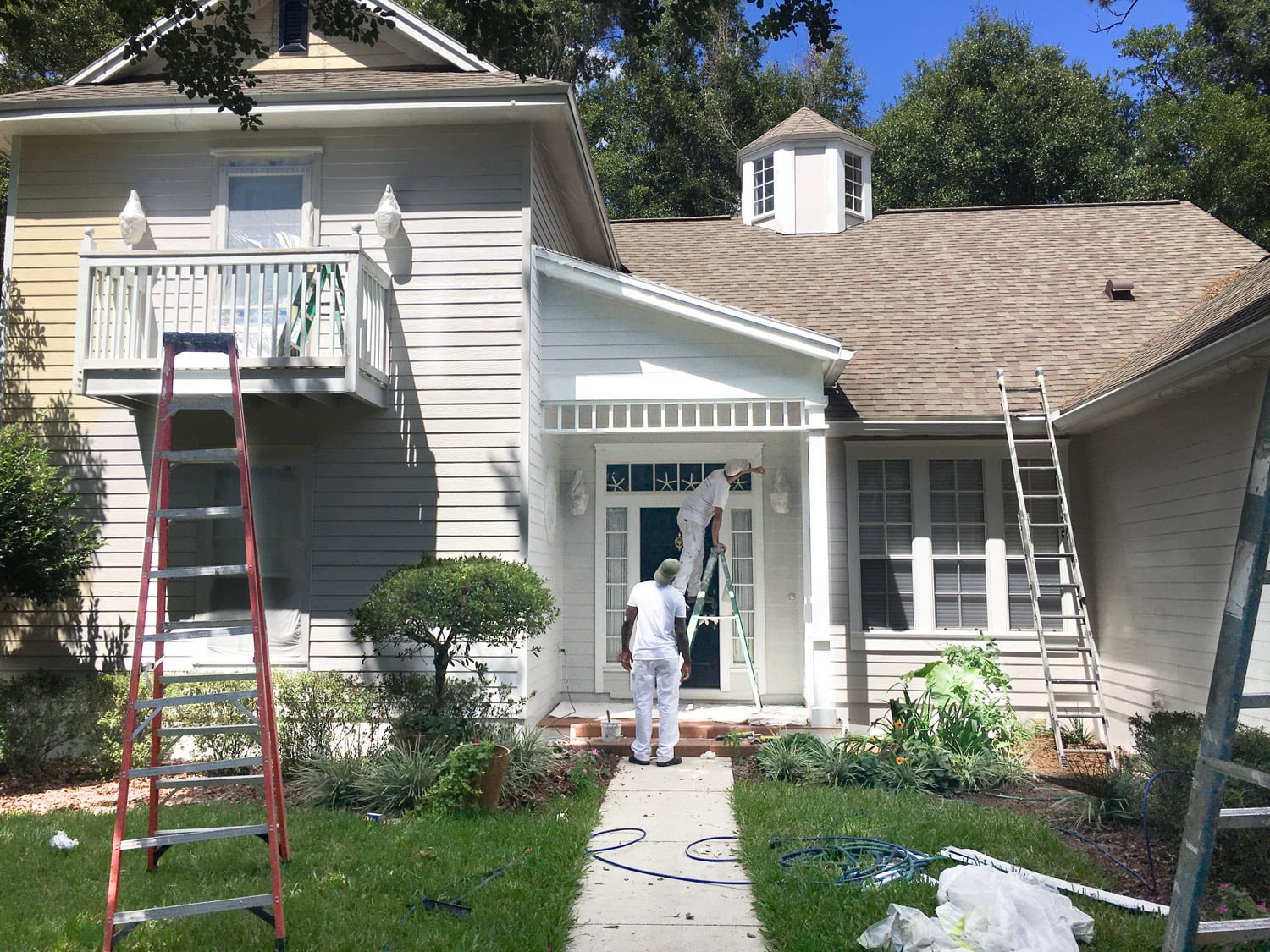 Painting a house in Gainesville Florida